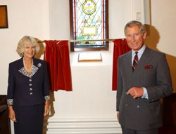 HRH the Duchess of Cornwall and HRH the Prince of Wales afer unveiling the plaque below the memorial window.